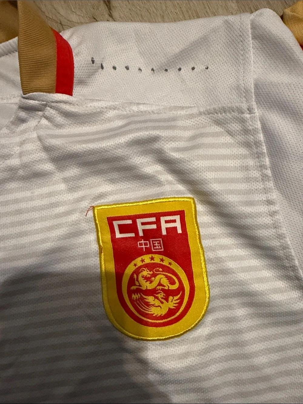 Nike Kids China Soccer Jersey with Red and Gold Accents